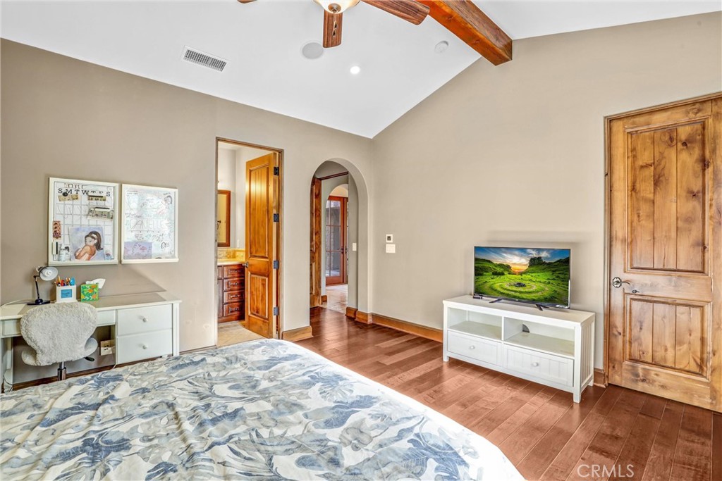 41 Needle Grass Irvine, CA 92603 - Photo 15 of 64 a bedroom with a bed and wooden floor