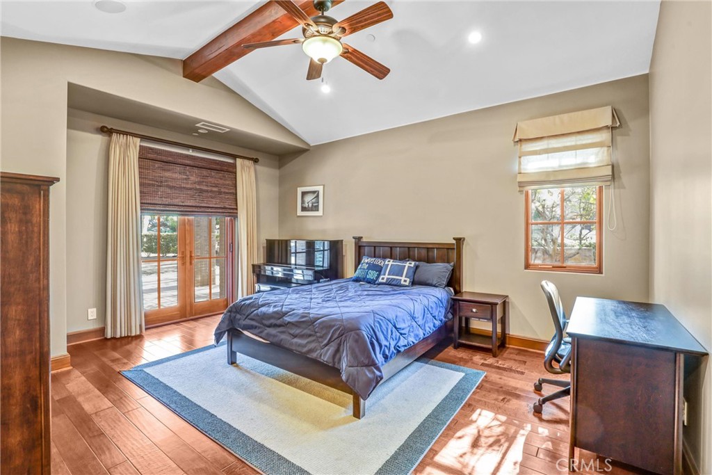 41 Needle Grass Irvine, CA 92603 - Photo 17 of 64 a bedroom with a bed and wooden floor