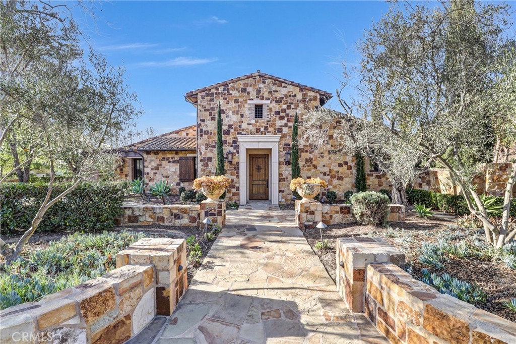 41 Needle Grass Irvine, CA 92603 - Photo 2 of 64 a view of house with outdoor seating space