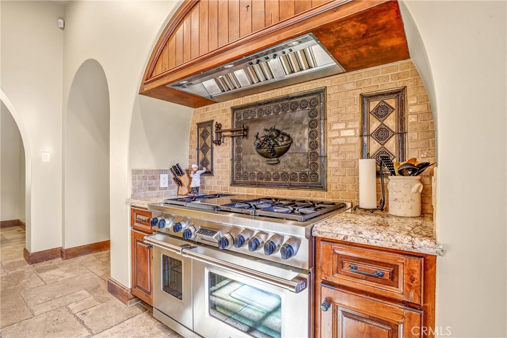 41 Needle Grass Irvine, CA 92603 - Photo 24 of 64 a kitchen with a stove and a microwave