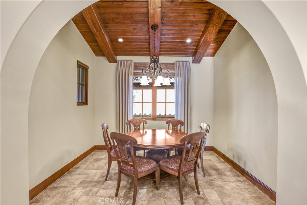 41 Needle Grass Irvine, CA 92603 - Photo 26 of 64 a view of a dining room with furniture and window