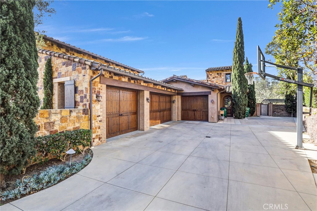 41 Needle Grass Irvine, CA 92603 - Photo 42 of 64 a front view of a house with garden