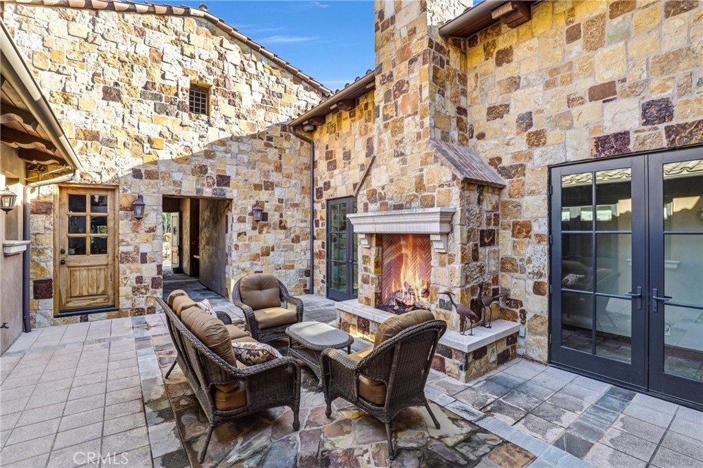 41 Needle Grass Irvine, CA 92603 - Photo 48 of 64 a building outdoor space with patio furniture and potted plants