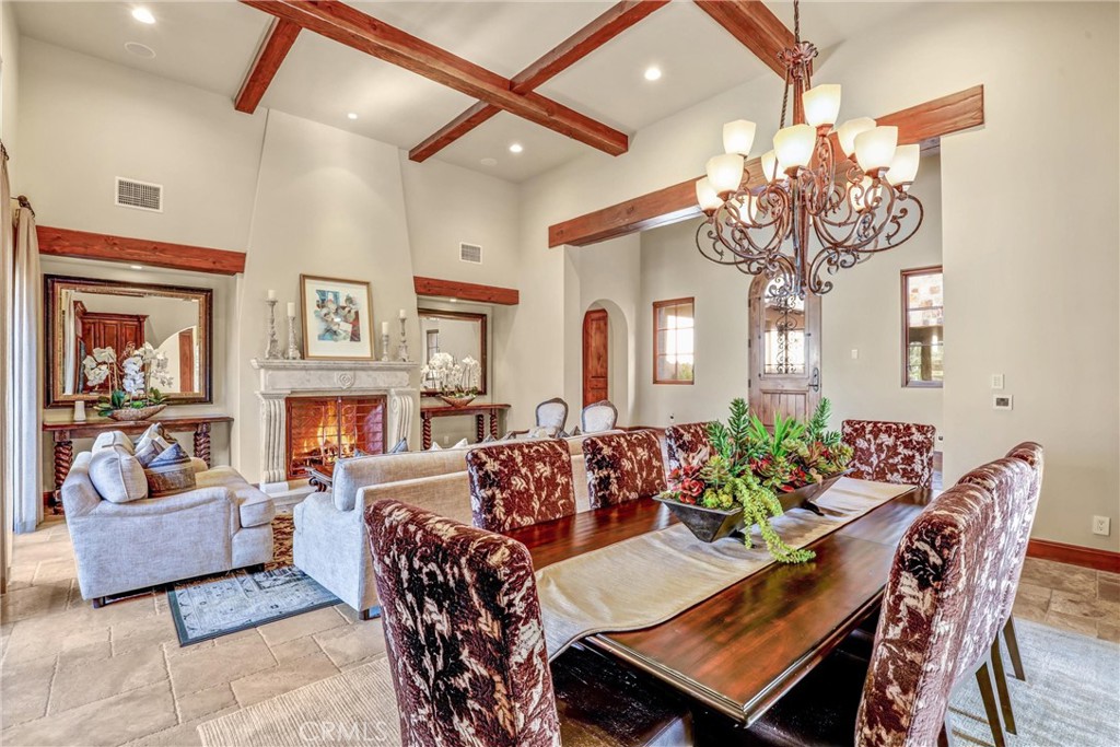 41 Needle Grass Irvine, CA 92603 - Photo 5 of 64 a view of a dining room with furniture and a chandelier
