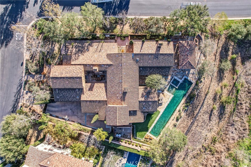 41 Needle Grass Irvine, CA 92603 - Photo 61 of 64 a front view of a house with a yard and wooden fence