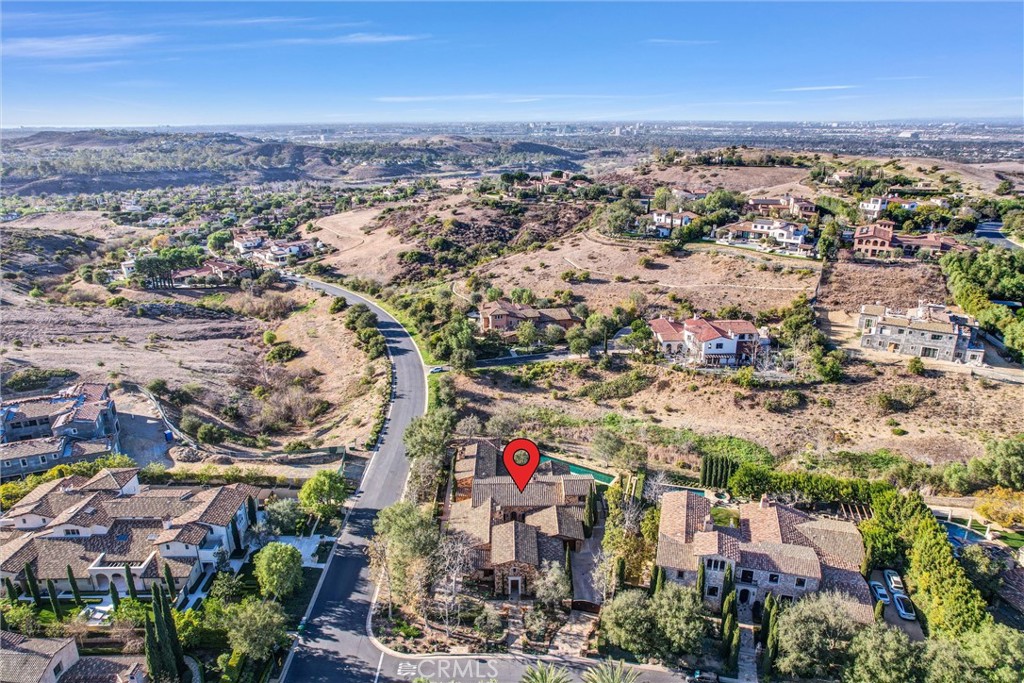 41 Needle Grass Irvine, CA 92603 - Photo 62 of 64 an aerial view of residential building and parking space