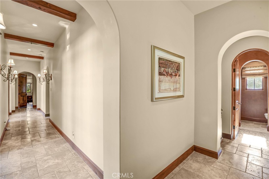 41 Needle Grass Irvine, CA 92603 - Photo 9 of 64 a view of gallery with wooden floor
