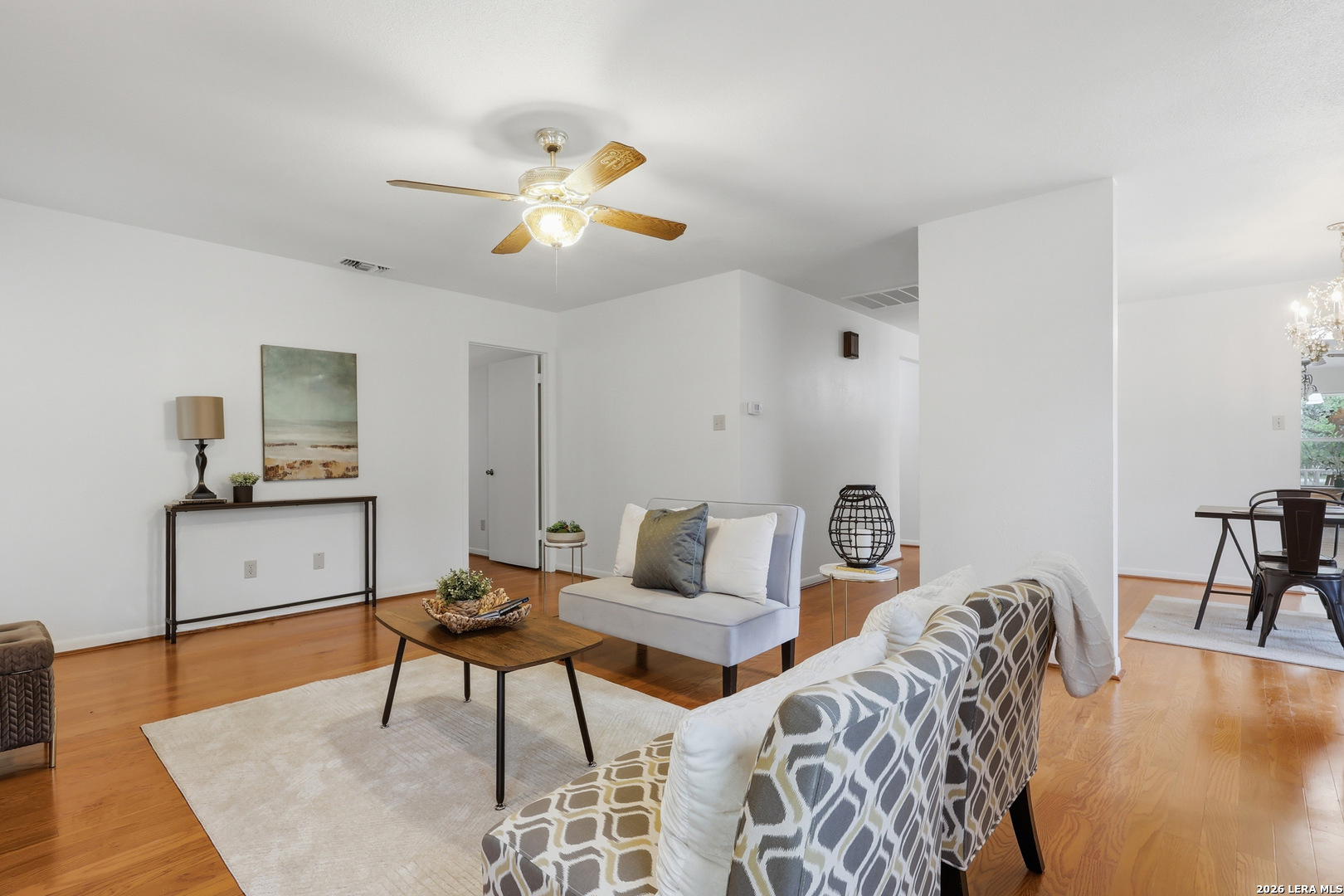 261 Fawn Lane Spring Branch, TX 78070 - Photo 9 of 44 a living room with furniture and a wooden floor