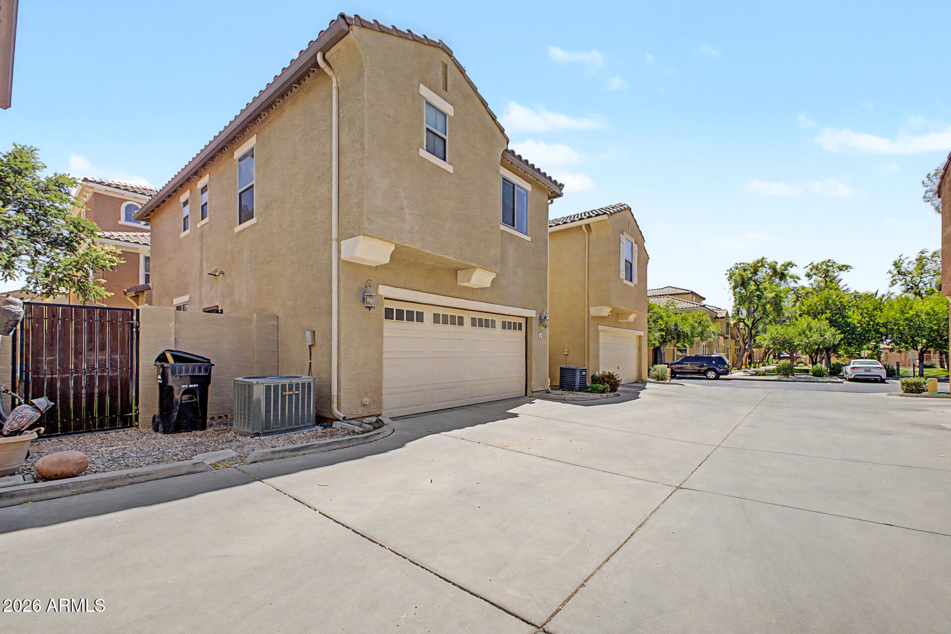 451 South Hawes Road, Unit 27 Mesa, AZ 85208 - Photo 25 of 27 a view of a street with a building