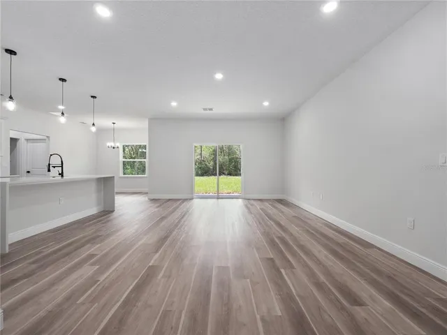 a view of an empty room and window