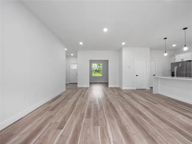 a view of an empty room and window