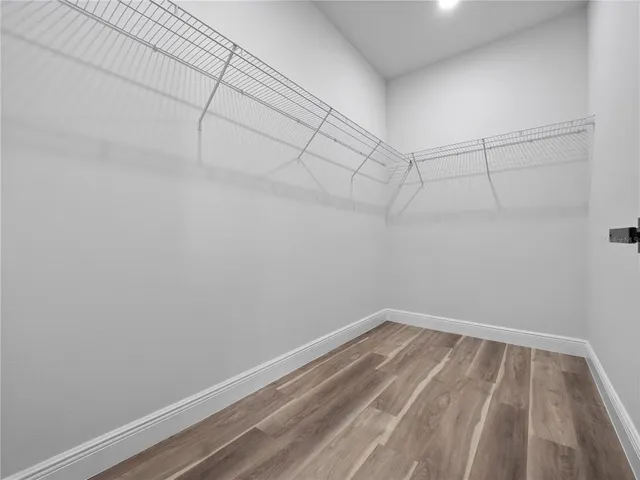 a view of a room with racks on the wall