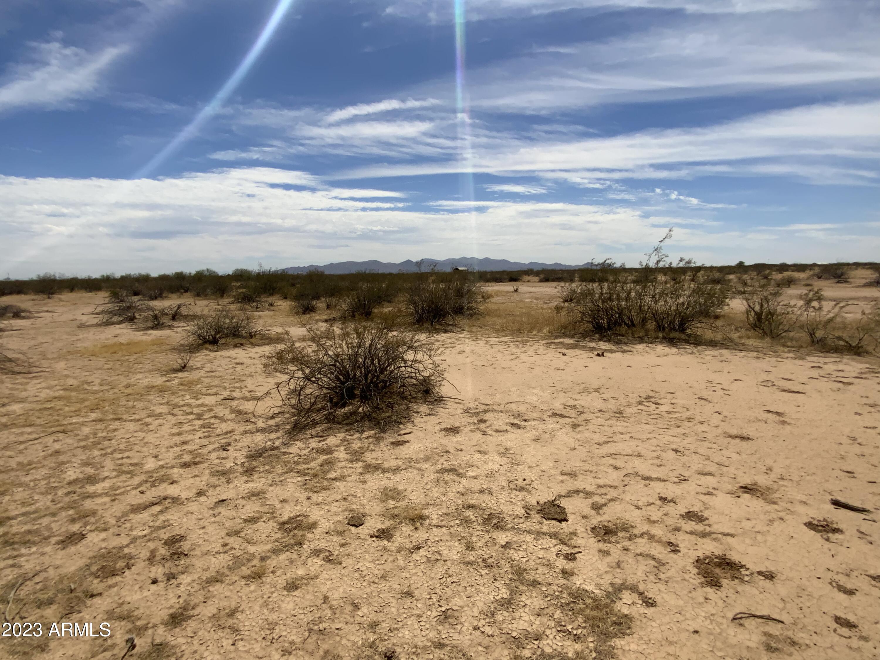32680 West Wildcat Drive, Unit R4 Wittmann, AZ 85361 - Photo 3 of 4 a view of an ocean beach