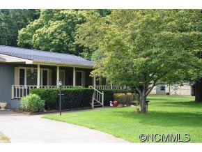 118 Riverside Drive Canton, NC 28716 - Photo 2 of 21 a view of a house with a backyard