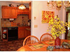118 Riverside Drive Canton, NC 28716 - Photo 17 of 21 a view of a kitchen area with granite countertop a rug