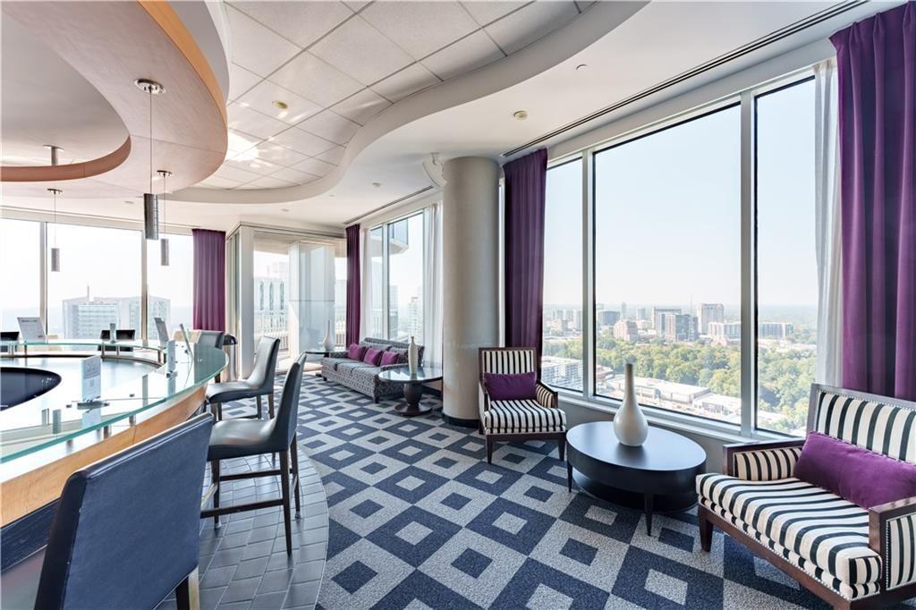 3338 Peachtree Road Northeast, Unit 1706 Atlanta, GA 30326 - Photo 30 of 35 a very nice looking living room with a large window