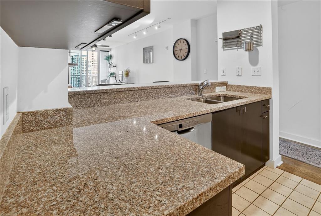 3338 Peachtree Road Northeast, Unit 1706 Atlanta, GA 30326 - Photo 10 of 35 a bathroom with a sink and a vanity