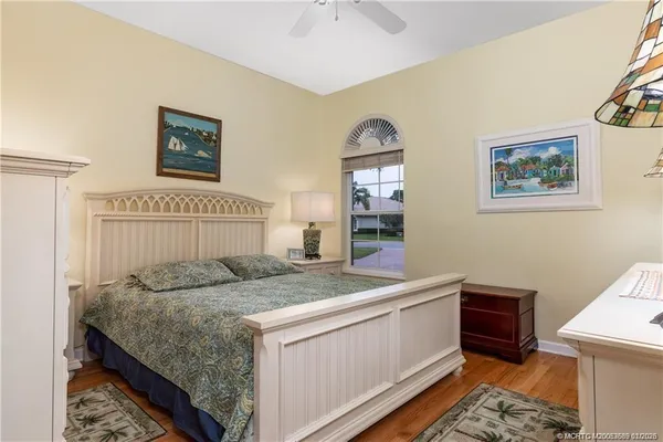 a view of a fountain with tree in the background