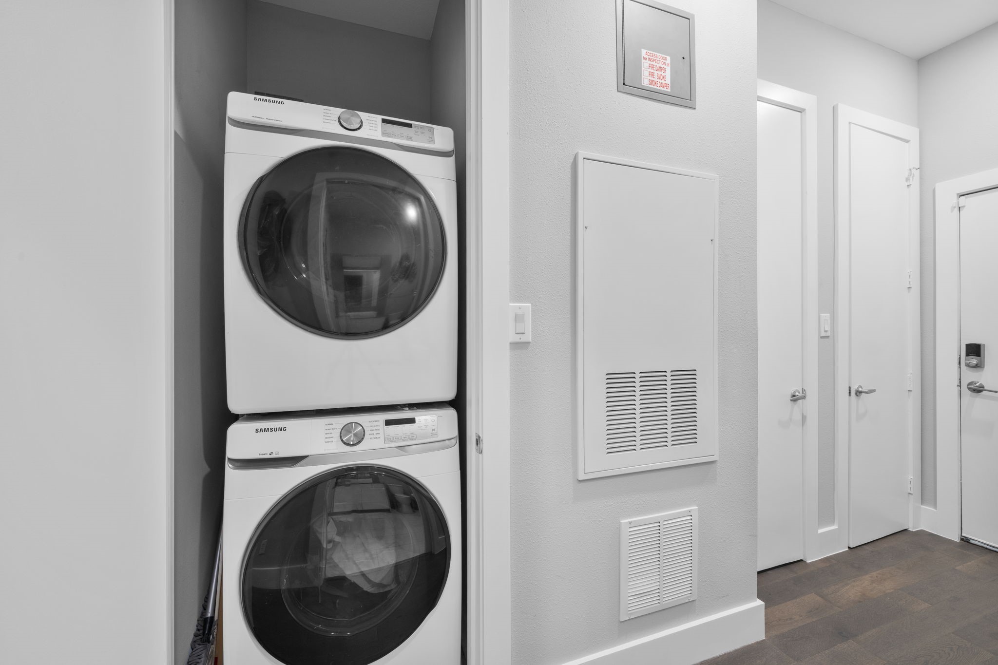 207 Pierce Street, Unit 209 Houston, TX 77002 - Photo 11 of 13 a utility room with dryer and washer