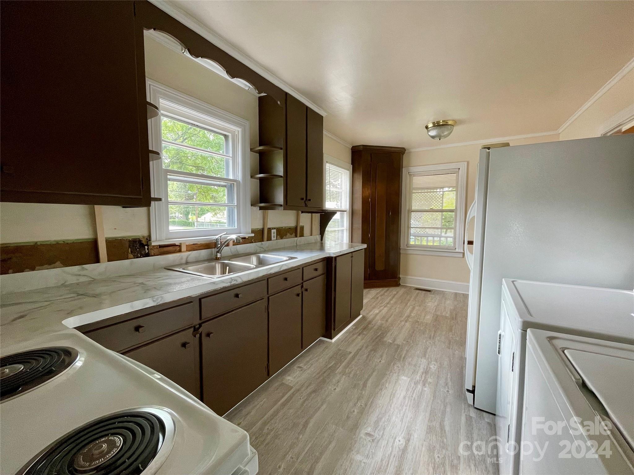 304 Rhyne Street Stanley, NC 28164 - Photo 14 of 38 a large bathroom with a sink mirror and a bathtub