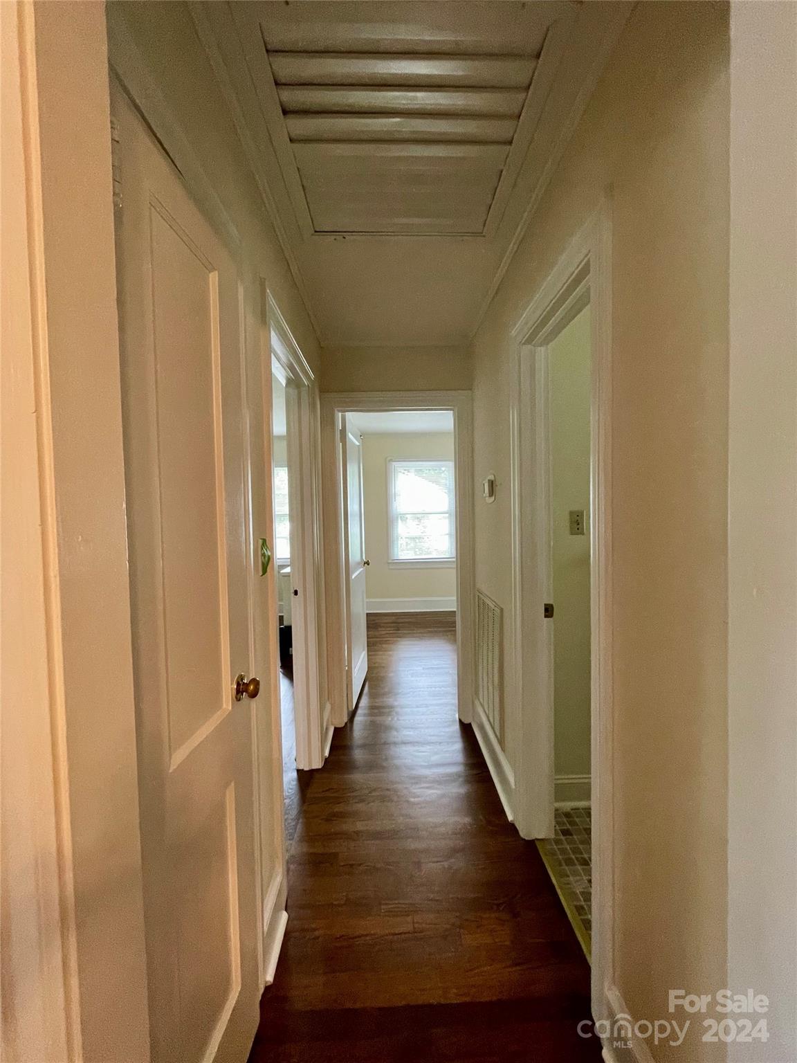 304 Rhyne Street Stanley, NC 28164 - Photo 30 of 38 a view of a hallway with wooden floor and staircase