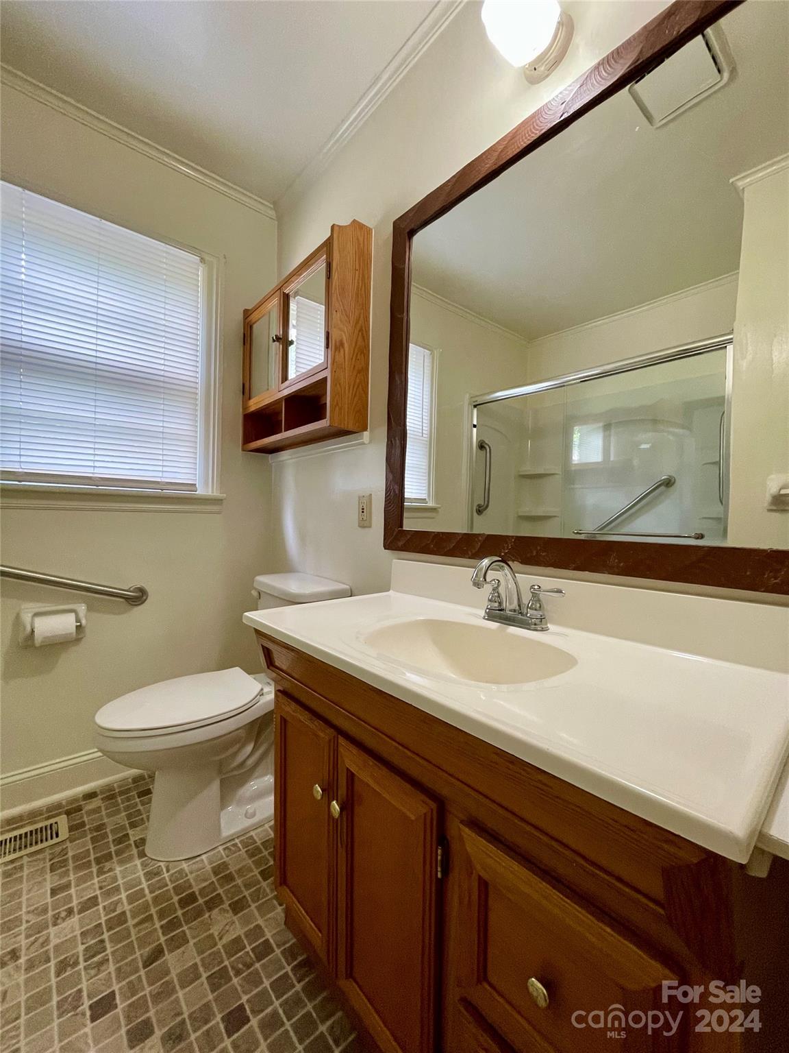 304 Rhyne Street Stanley, NC 28164 - Photo 36 of 38 a bathroom with a granite countertop sink and a mirror