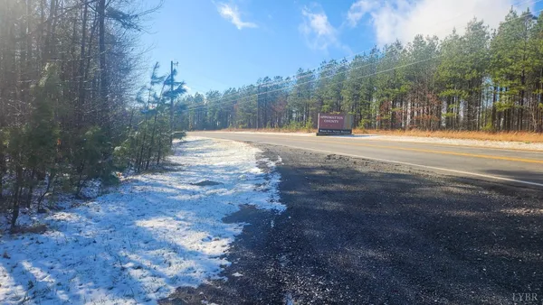 a view of road with trees