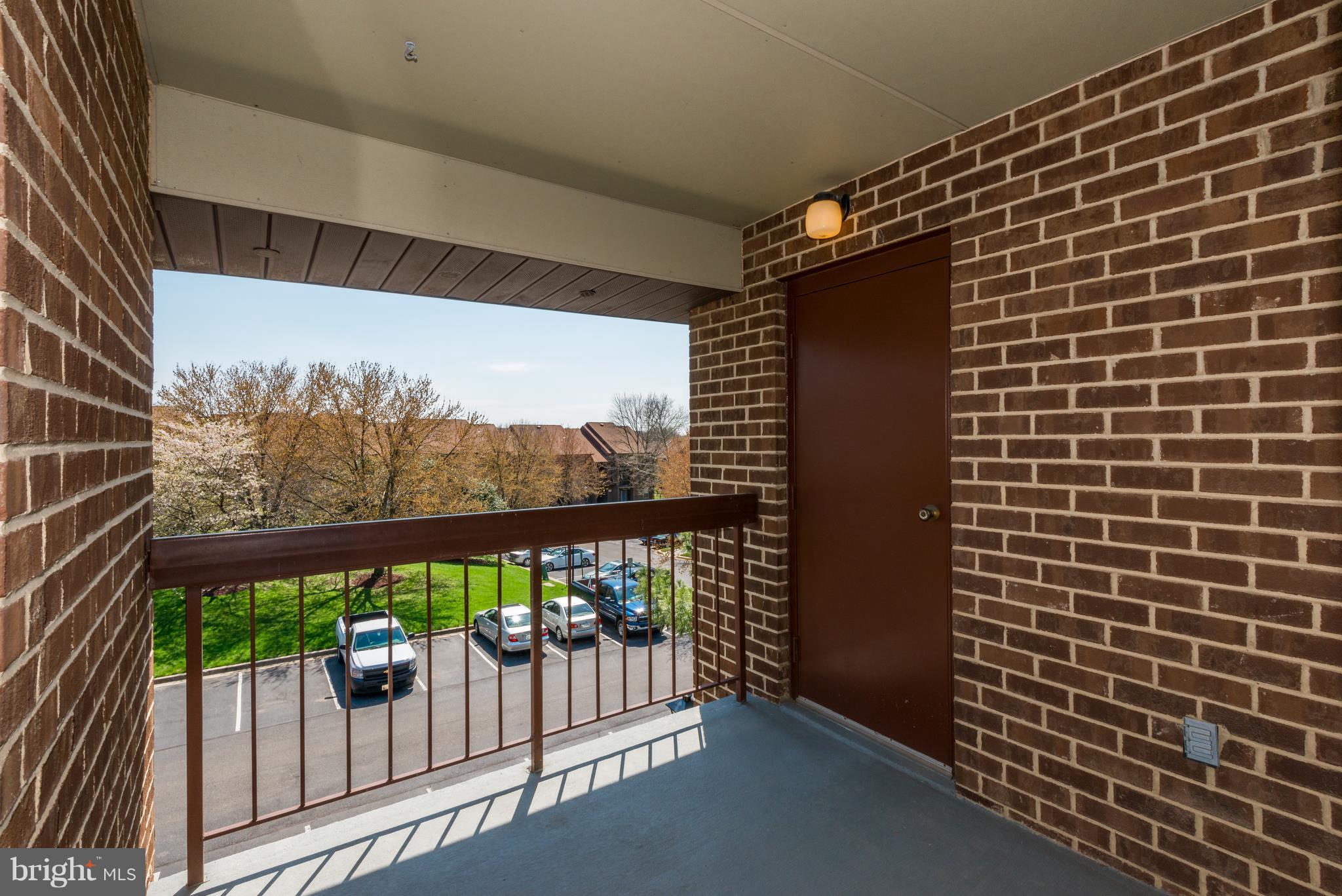 7804 Guildberry Court, Unit 303 Gaithersburg, MD 20879 - Photo 18 of 21 a view of a balcony