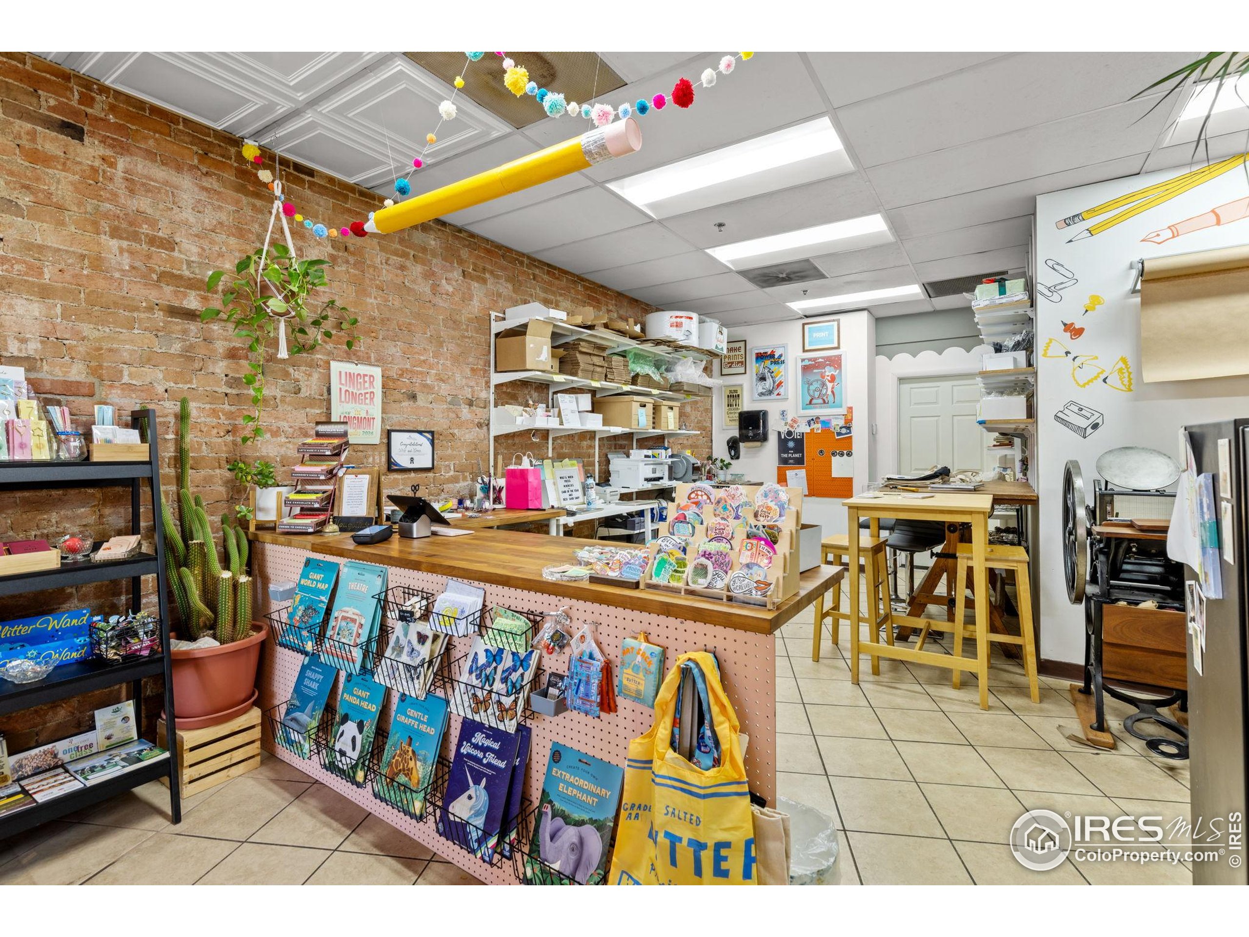 331 Main Street Longmont, CO 80501 - Photo 11 of 50 a utility room with lots of wooden furniture