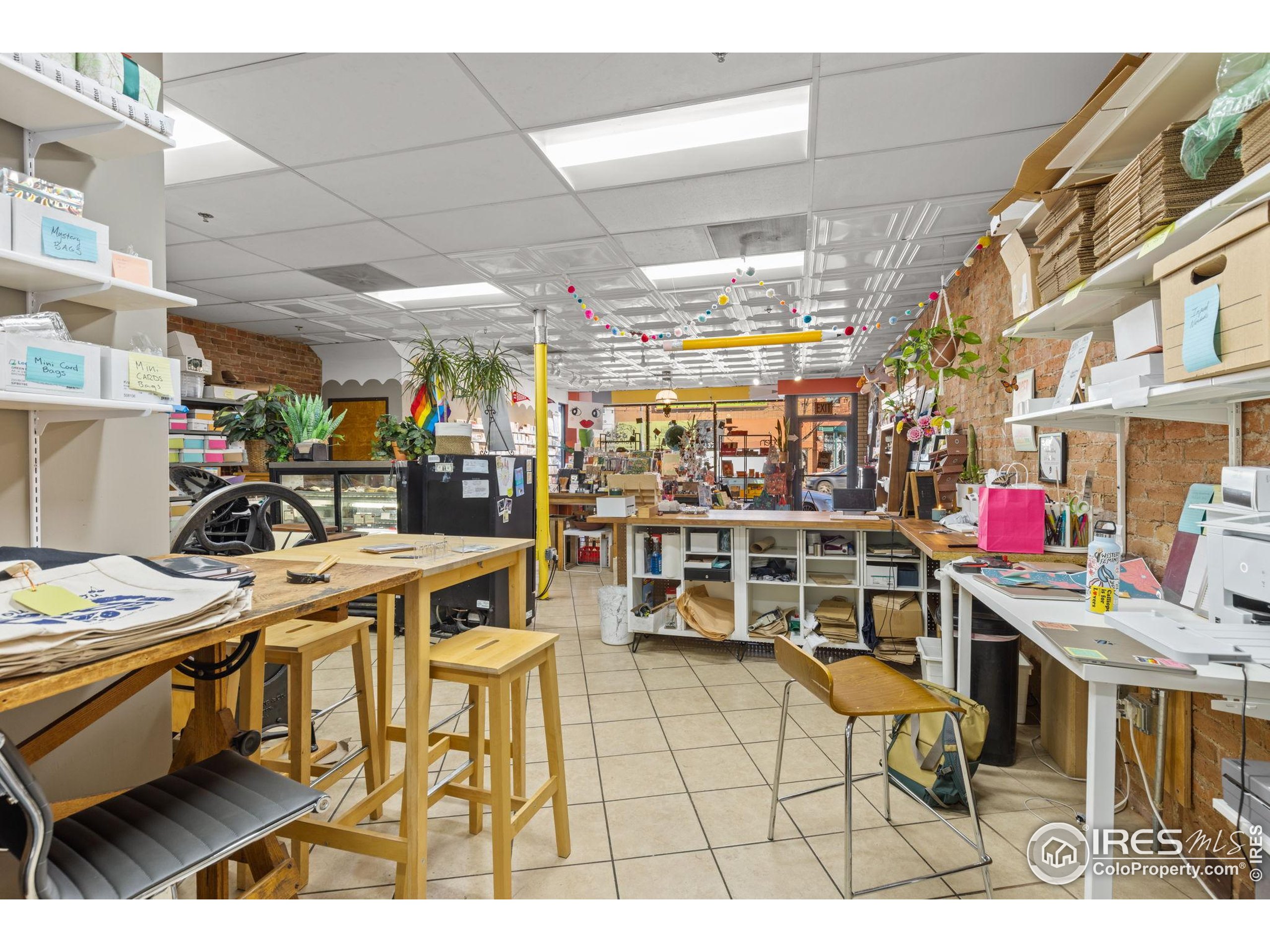 331 Main Street Longmont, CO 80501 - Photo 12 of 50 a view of a dining room with furniture