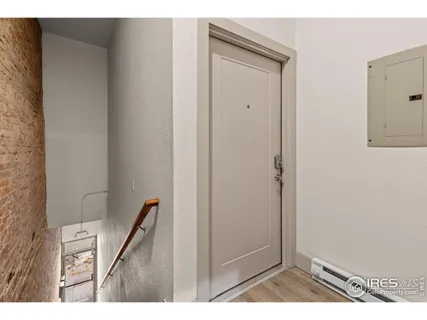 a kitchen with a sink a counter space and appliances
