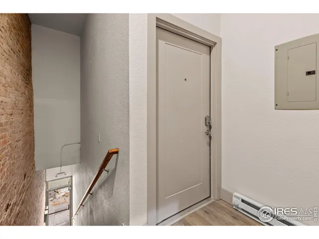 a kitchen with a sink a counter space and appliances
