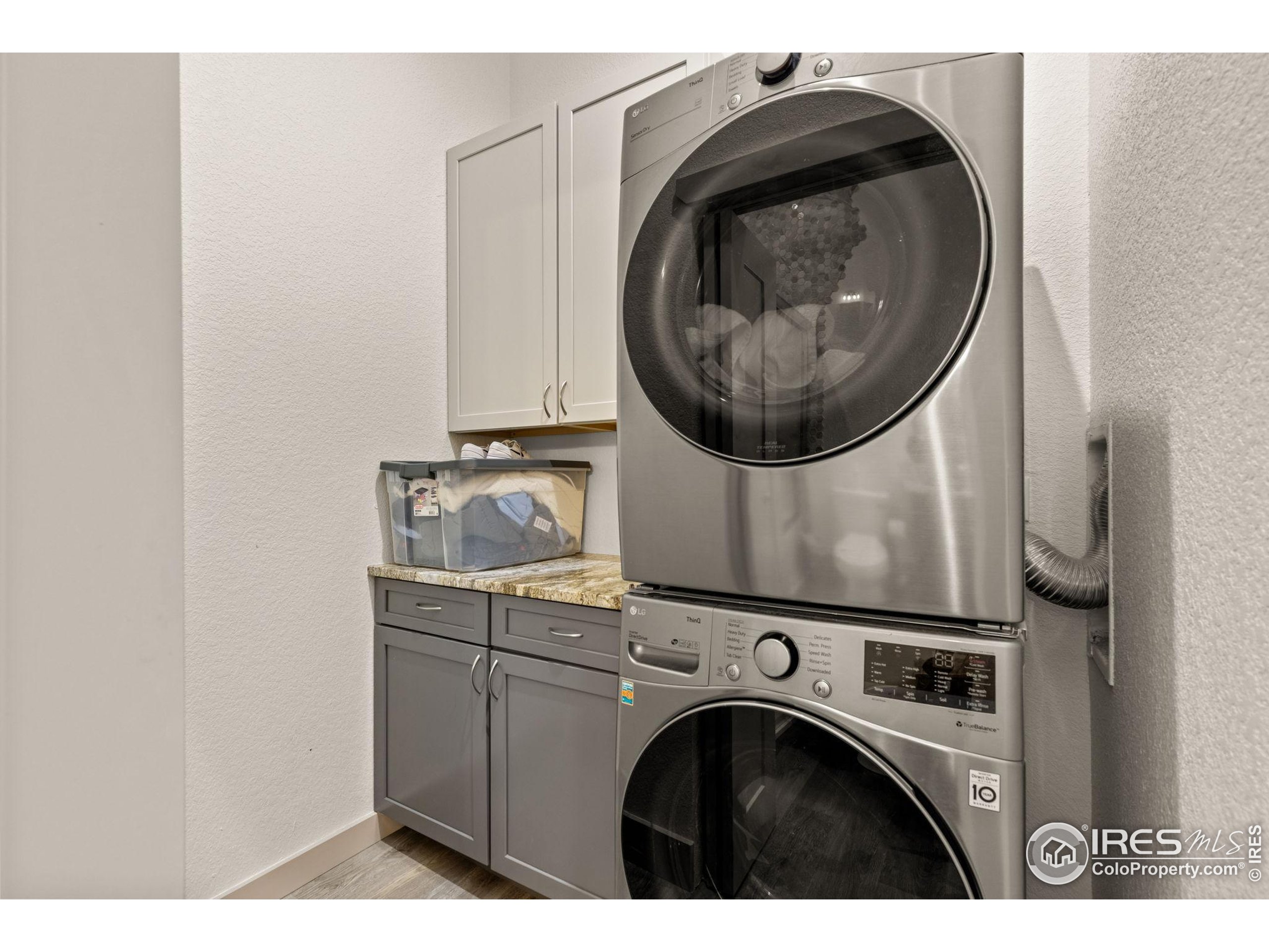 331 Main Street Longmont, CO 80501 - Photo 35 of 50 a utility room with dryer and washer