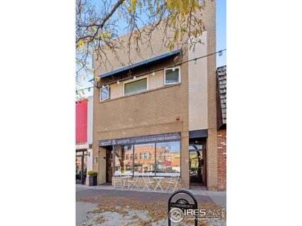 a front view of a building with street