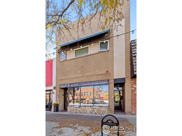 a front view of a building with street