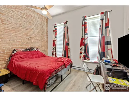 a bathroom with a sink mirror and vanity