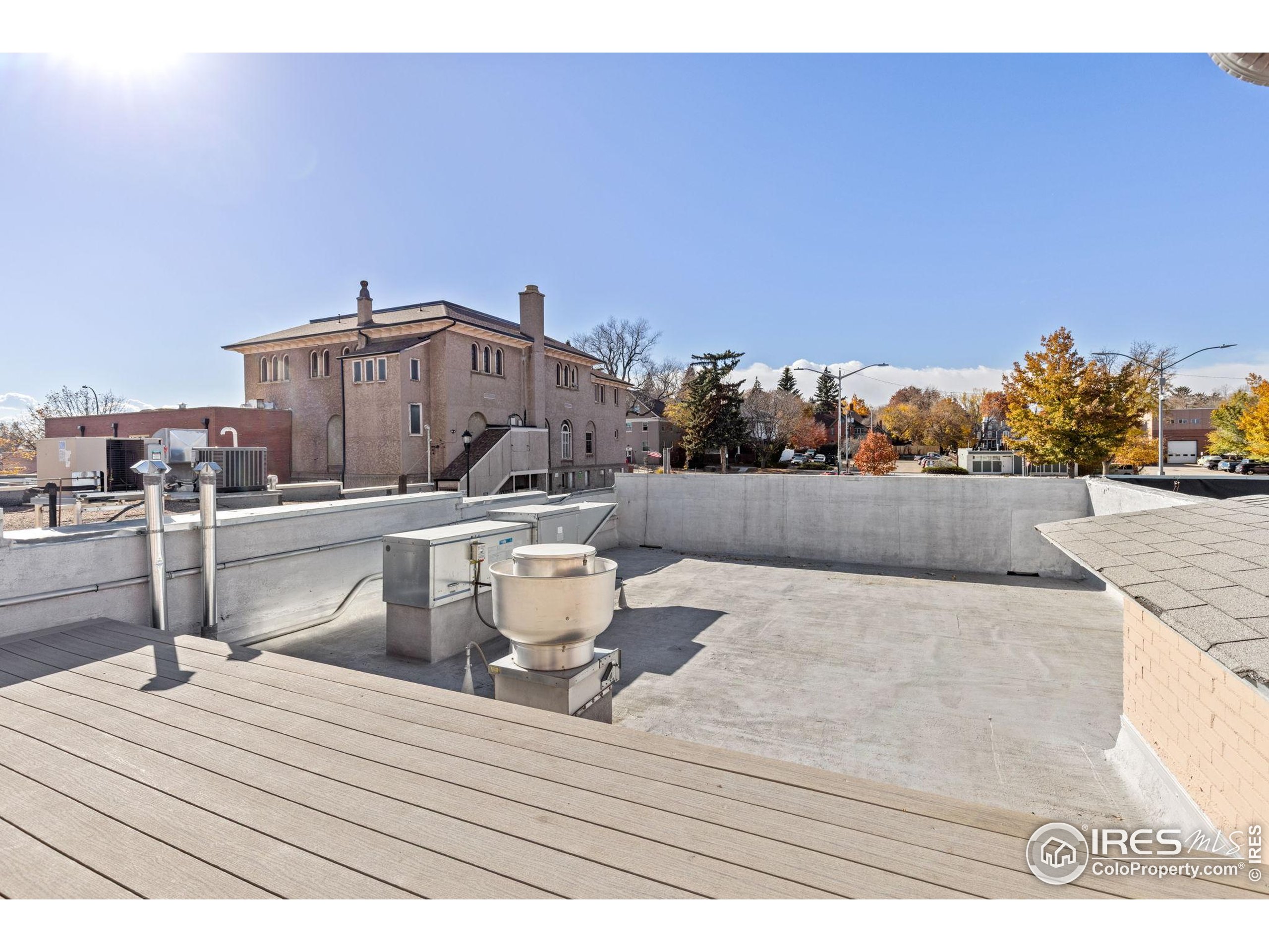 331 Main Street Longmont, CO 80501 - Photo 46 of 50 a view of a terrace with furniture and stove