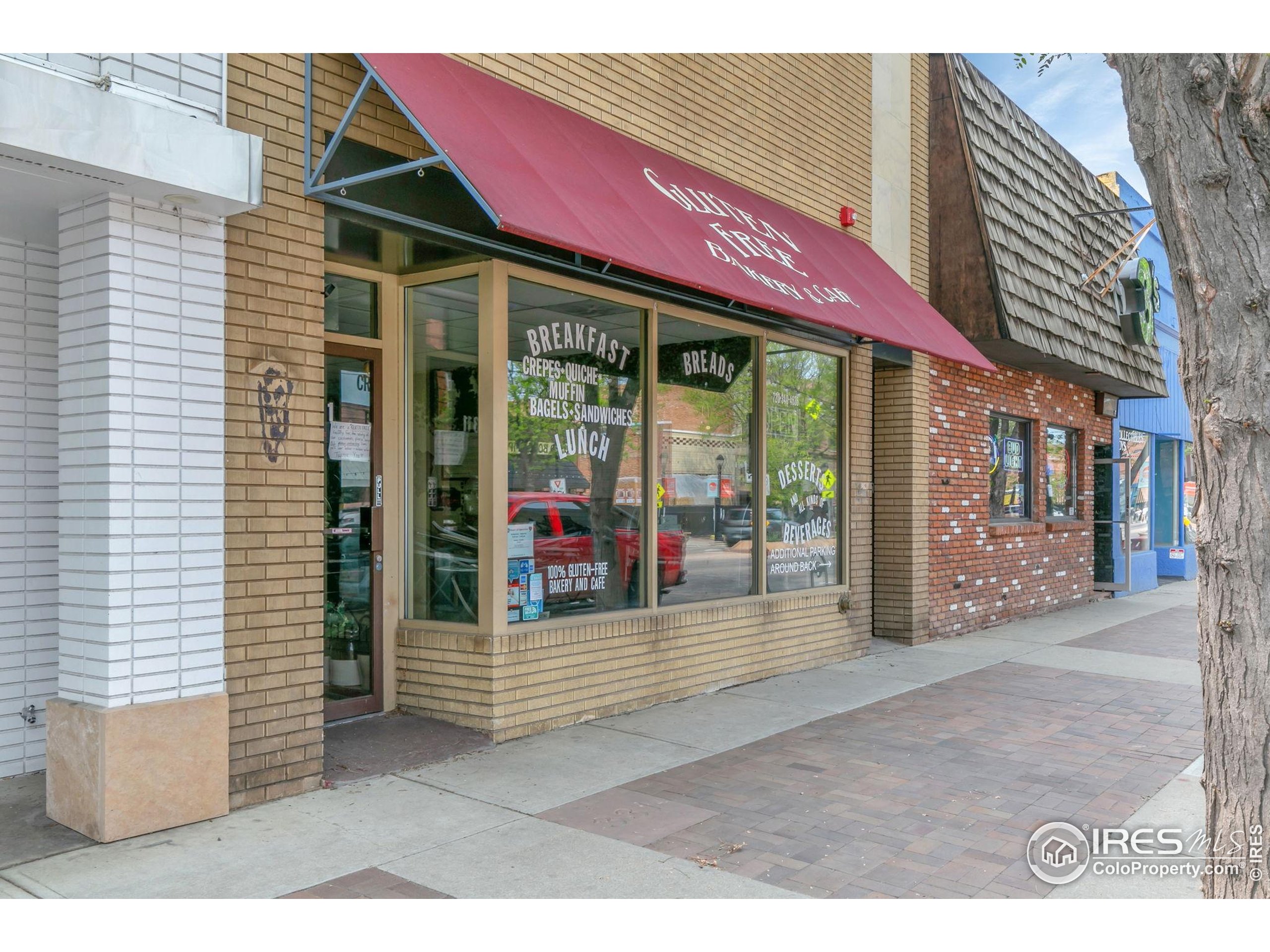 331 Main Street Longmont, CO 80501 - Photo 47 of 50 a view of a patio with a table and chairs and potted plants