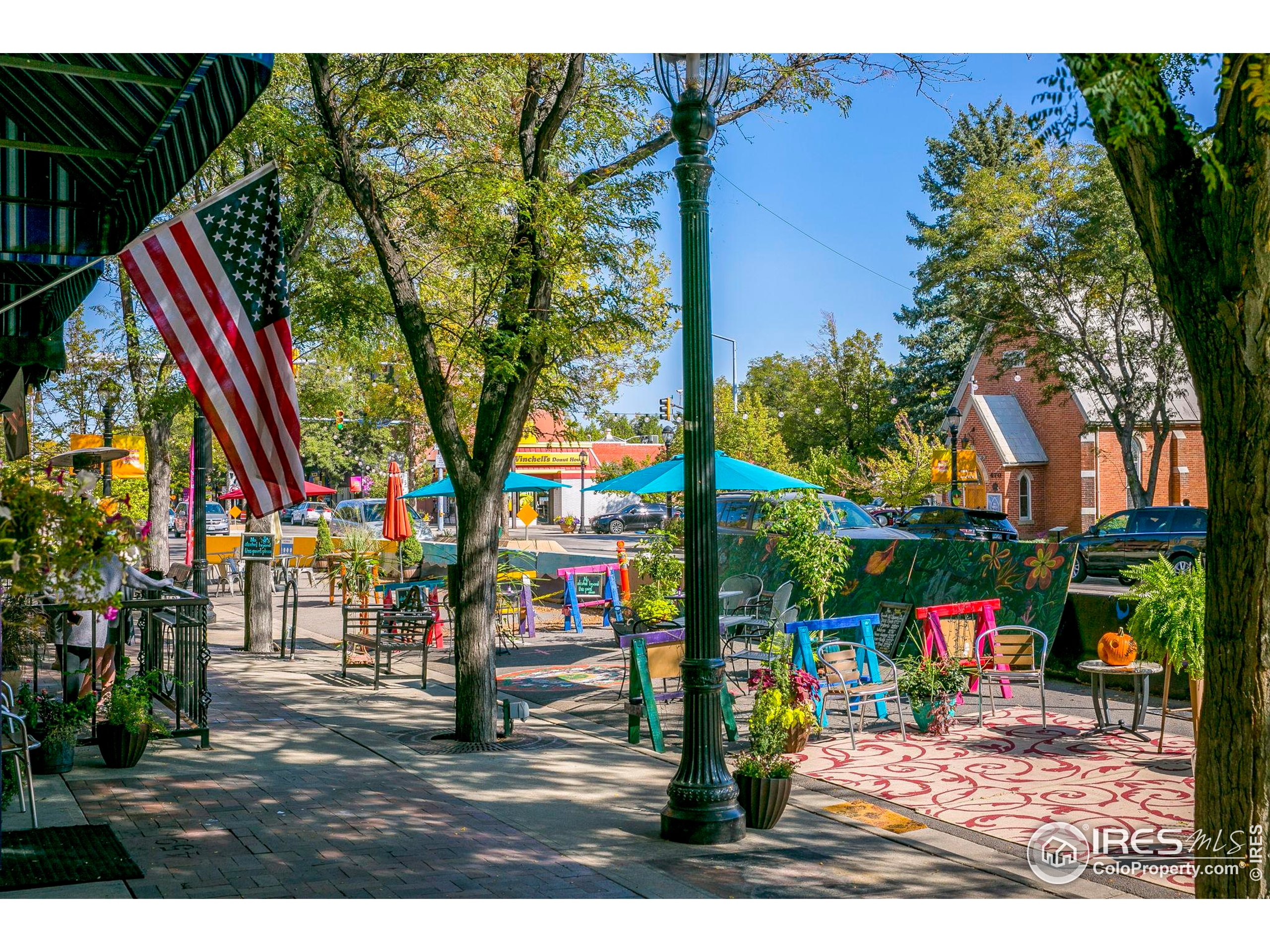 331 Main Street Longmont, CO 80501 - Photo 48 of 50 a view of park with large trees and wooden fence
