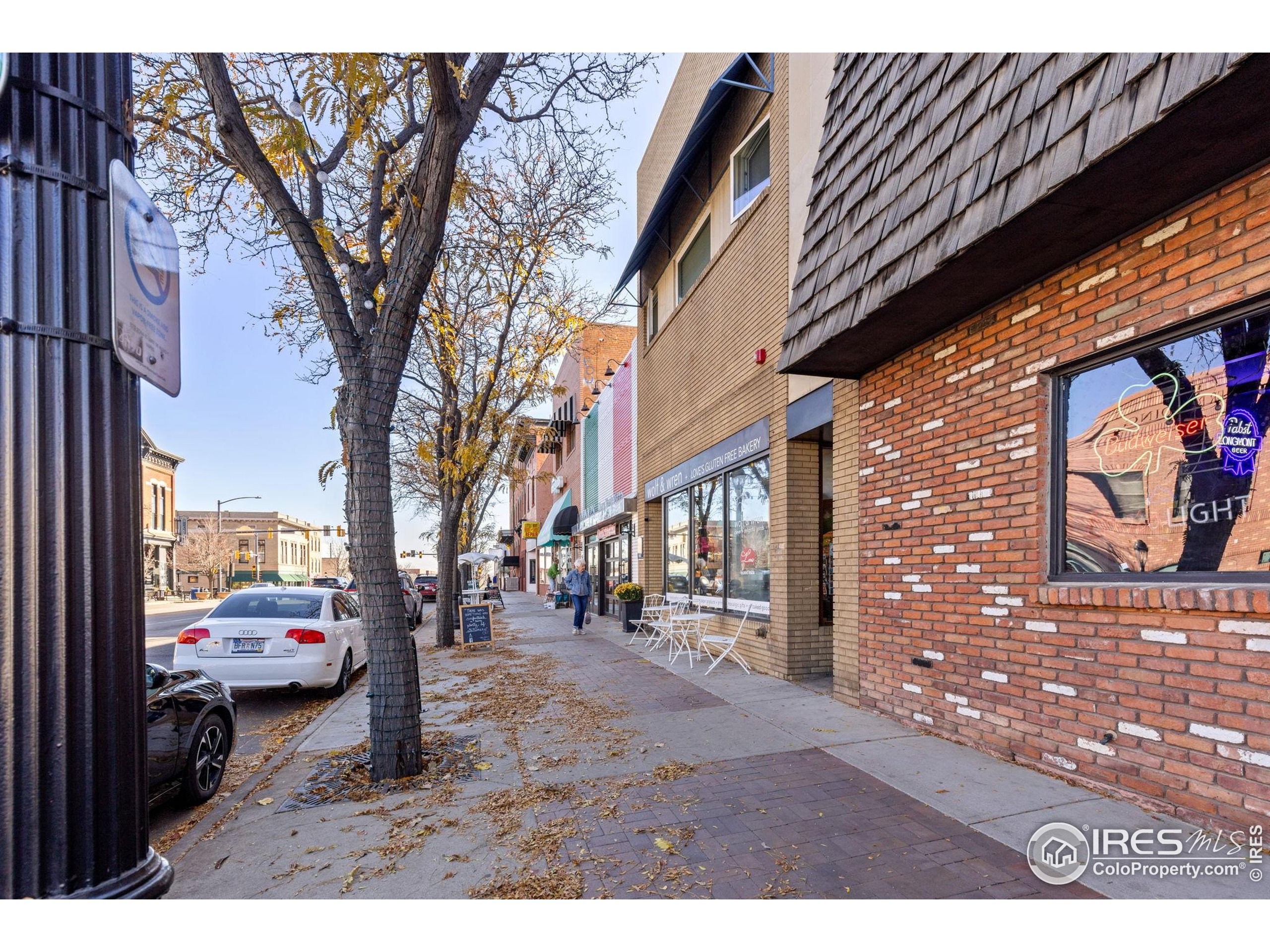 331 Main Street Longmont, CO 80501 - Photo 8 of 50 a backyard of a house with cars parked