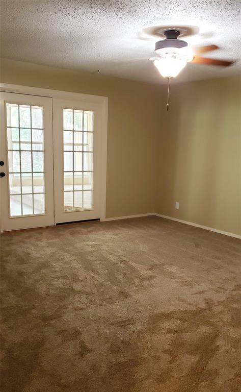 401 South Timberlane Lone Star, TX 75668 - Photo 11 of 27 an empty room with windows