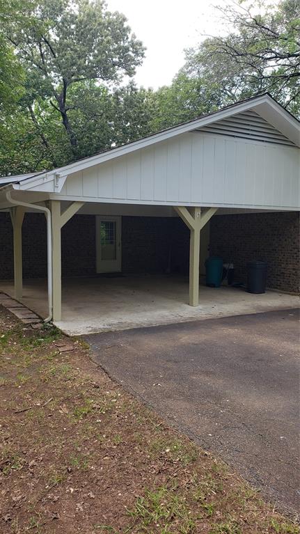 401 South Timberlane Lone Star, TX 75668 - Photo 22 of 27 a backyard of a house