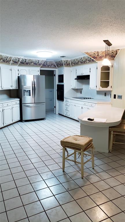 401 South Timberlane Lone Star, TX 75668 - Photo 8 of 27 a view of a terrace with chairs