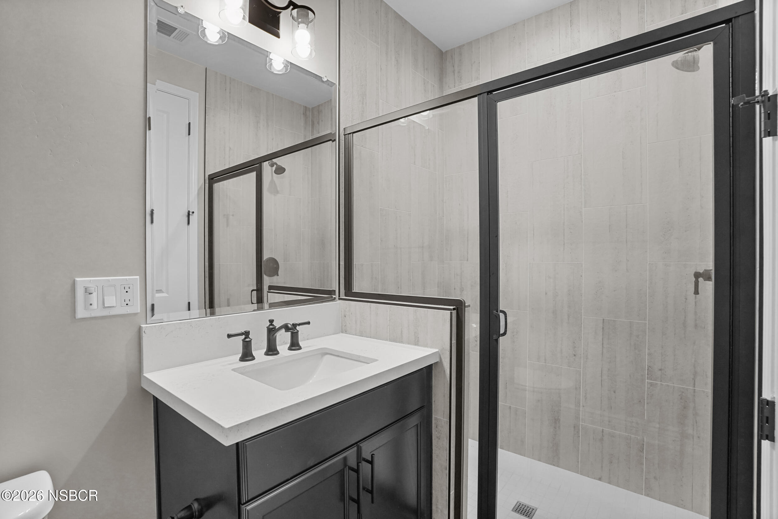 1147 Ginger Place Santa Maria, CA 93455 - Photo 11 of 55 a bathroom with a sink and a mirror