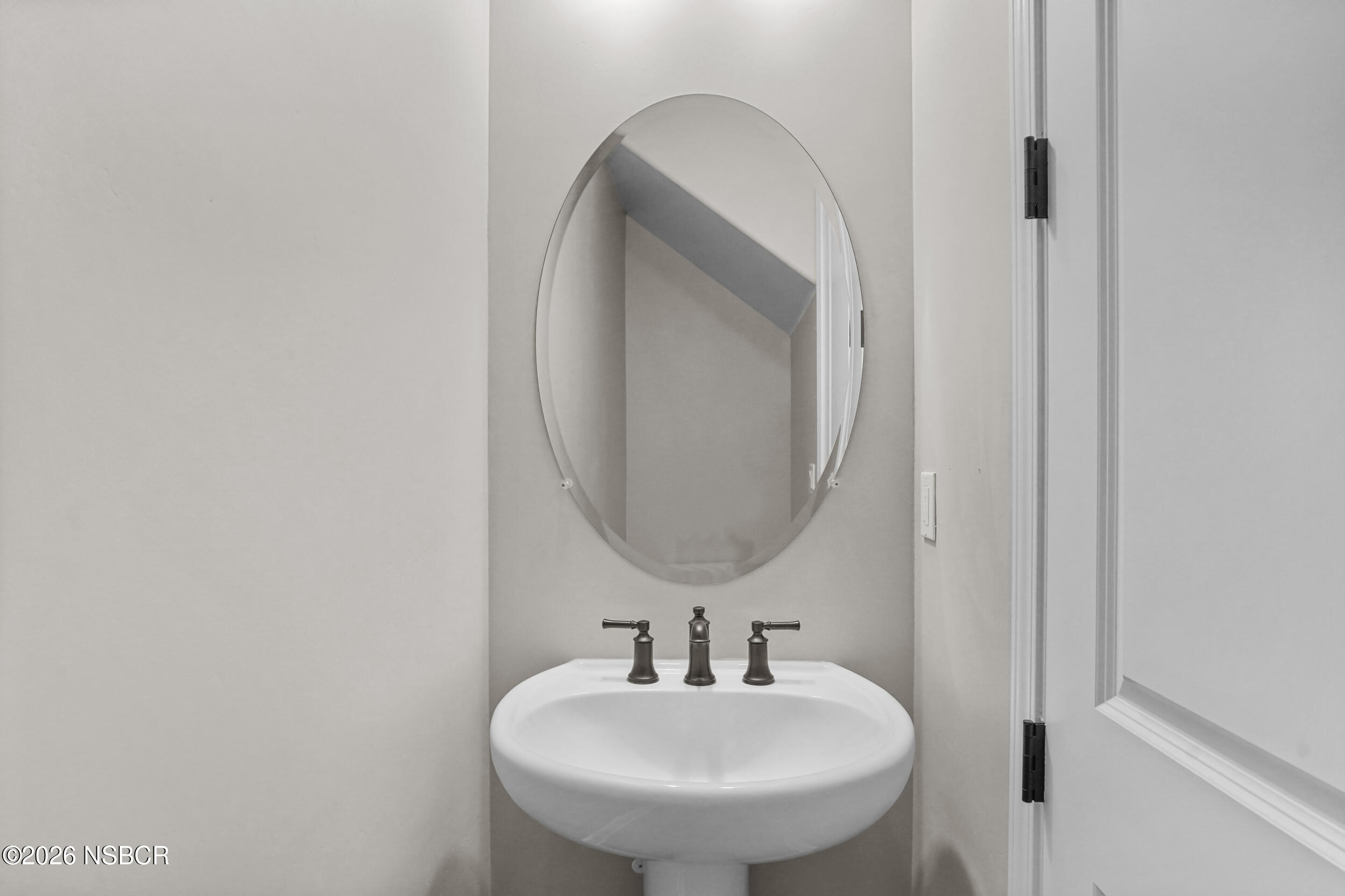1147 Ginger Place Santa Maria, CA 93455 - Photo 12 of 55 a bathroom with a sink and a mirror