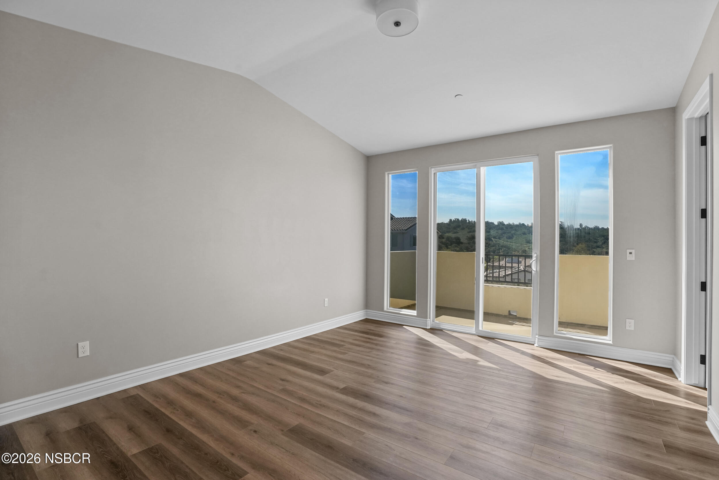1147 Ginger Place Santa Maria, CA 93455 - Photo 13 of 55 a view of an empty room with wooden floor and a window
