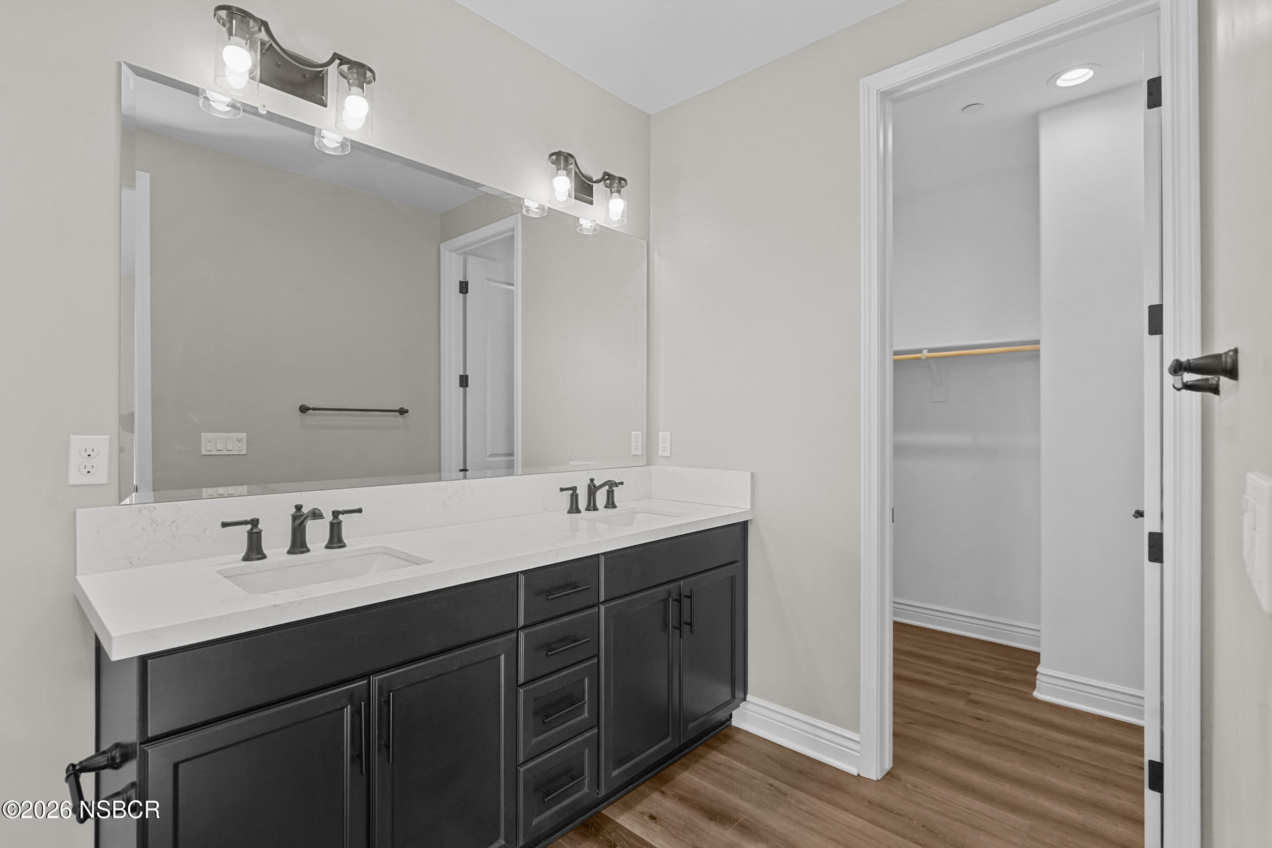 1147 Ginger Place Santa Maria, CA 93455 - Photo 15 of 55 a bathroom with a double vanity sink mirror and shower