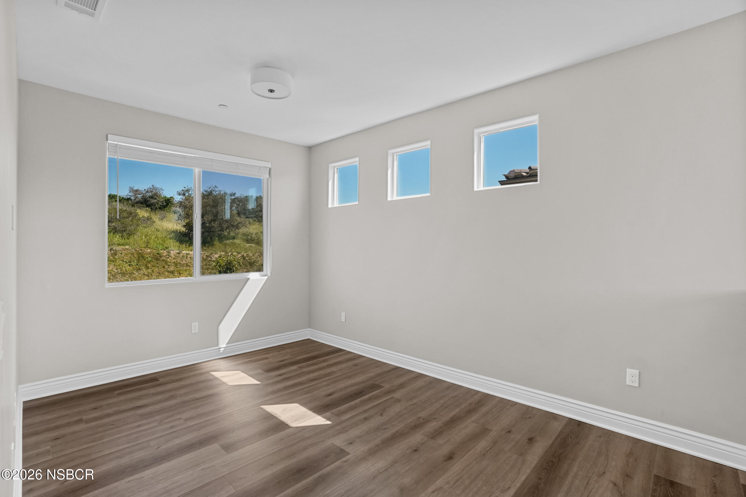 1147 Ginger Place Santa Maria, CA 93455 - Photo 23 of 55 a view of empty room with wooden floor and fan