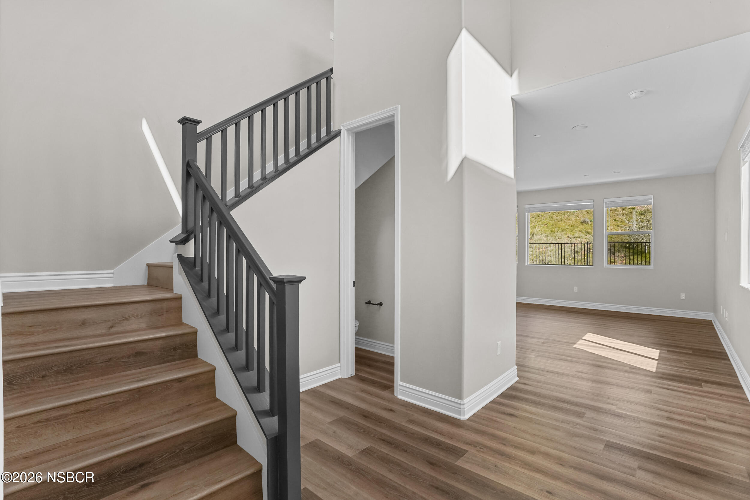 1147 Ginger Place Santa Maria, CA 93455 - Photo 4 of 55 a view of entryway with wooden floor and stairs
