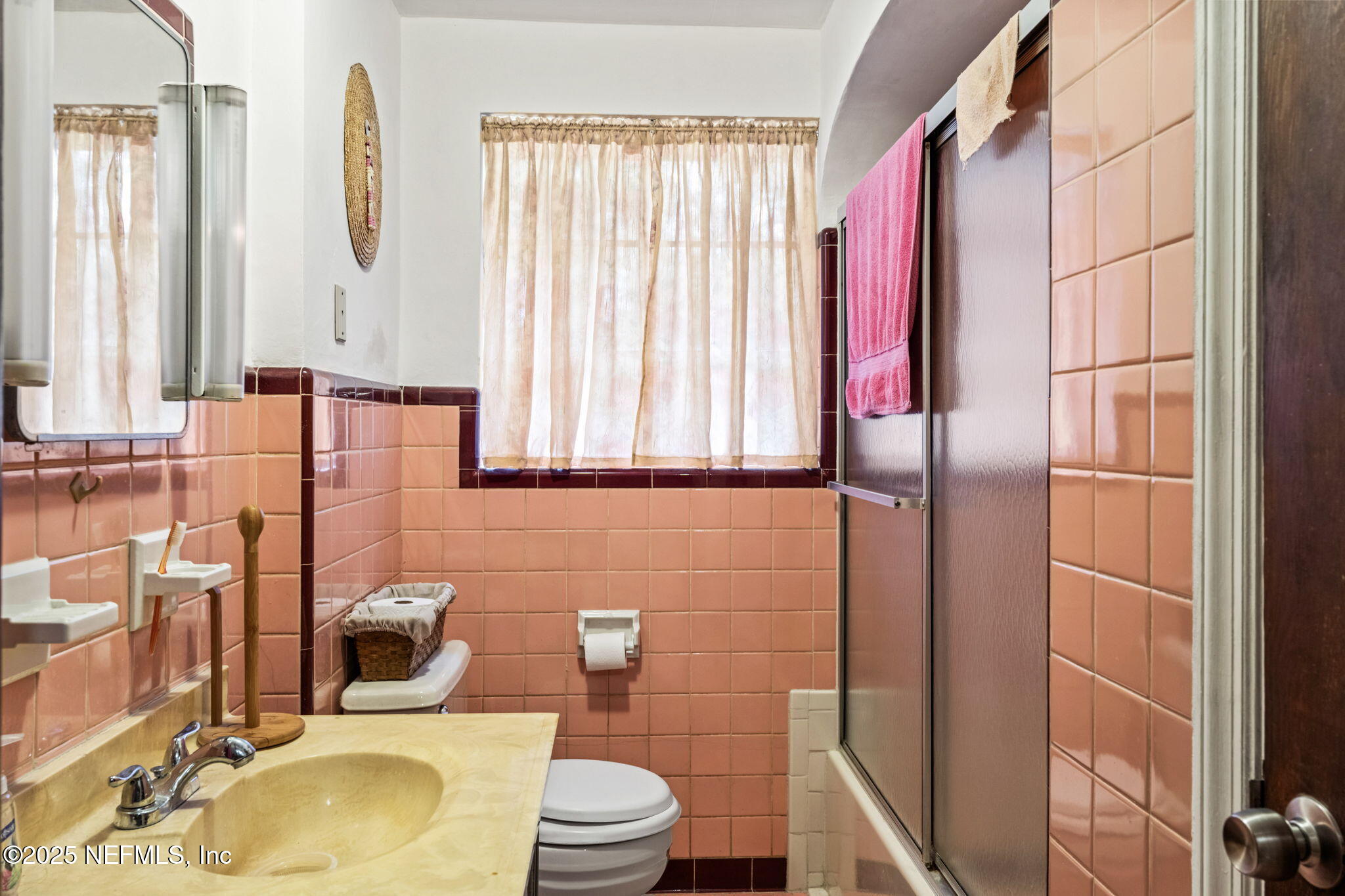5705 CR 208 St. Augustine, FL 32092 - Photo 28 of 86 a bathroom with a granite countertop toilet sink and mirror
